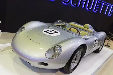 A 1959 Porsche 718 RSK on display at Retromobile, the mid-engined racing car whose number the modern 718 Cayman carries.