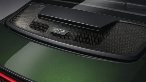 The rear engine cover and intake mesh of a facelifted 992.2 Porsche 911 GT3, whose 4.0-litre flat six uses solid cam finger followers to keep its 9,000rpm limit under stricter emissions rules.