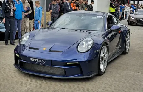 A 2024 Porsche 911 992 S/T photographed outdoors, using carbon-fibre doors and front fenders from the GT3 RS to become the lightest 992-generation 911.