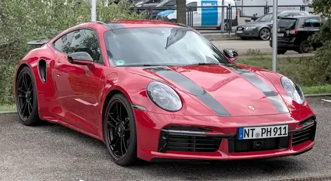 A Porsche 992 Turbo S photographed front three-quarter, from the generation whose manual gearbox option later arrived on a single Turbo model.