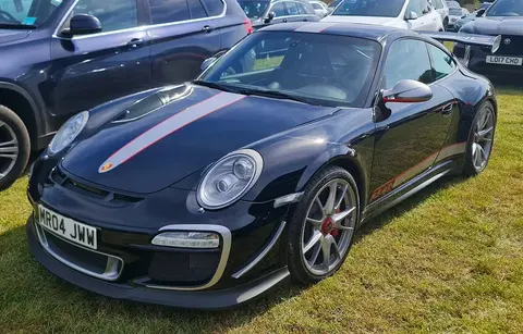 A 2011 Porsche 911 GT3 RS 4.0 at a classic car show, from the 997.2 generation entered road-registered in the Nurburgring 24 Hours.