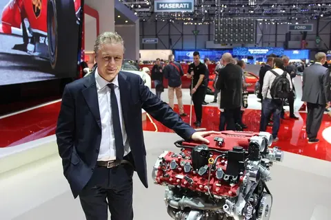 The twin-turbo V8 engine bay of a Ferrari California T, the engine family that donated its bore and stroke to the Alfa Romeo Giulia Quadrifoglio's V6.