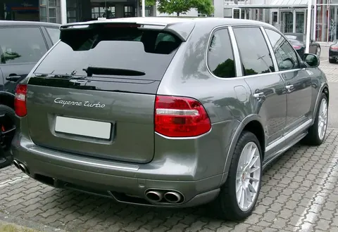 The rear of a facelifted Porsche Cayenne Turbo, the 957-generation model that introduced direct fuel injection.