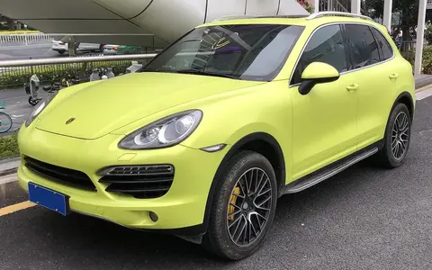 A second-generation Porsche Cayenne 958 photographed in three-quarter view, from the platform that shed roughly 250kg despite growing.