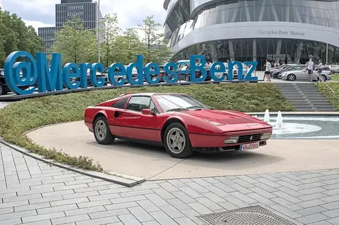 A Ferrari 328 GTS parked outdoors, from the model line where anti-lock brakes were phased in mid-production.