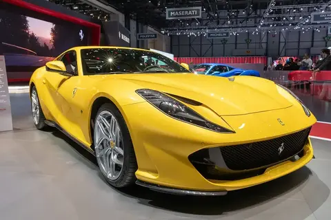 A Ferrari 812 Superfast at a motor show, fitted with the Virtual Short Wheelbase 2.0 rear-steering system.
