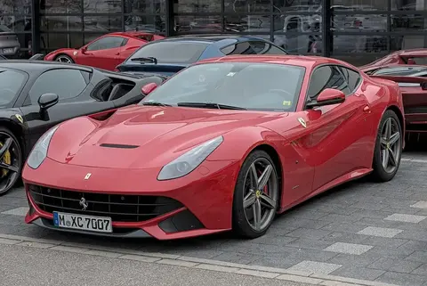 A Ferrari F12berlinetta, whose AeroBridge channels air across the bonnet to generate downforce.