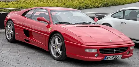 A Ferrari F355 Berlinetta in three-quarter view, the model that introduced Ferrari's electrohydraulic paddle-shift gearbox.