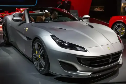 A Ferrari Portofino at a motor show, the retractable-hardtop convertible built on a reworked California T platform.