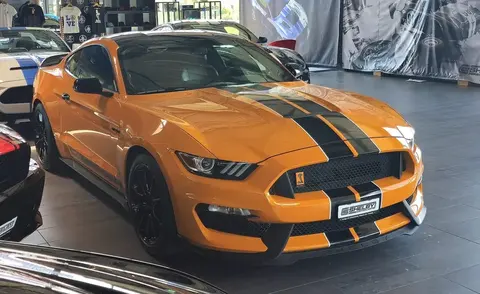 A Ford Mustang Shelby GT350, powered by the first production Ford V8 ever built with a flat-plane crankshaft.