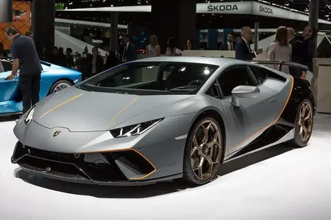A Lamborghini Huracan Performante on the show stand, its rear wing part of the motor-free active aero system.
