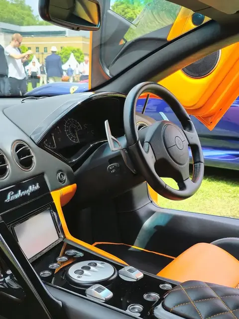 A Lamborghini Murcielago in three-quarter view, from the generation that closed out manual V12 Lamborghinis for good.