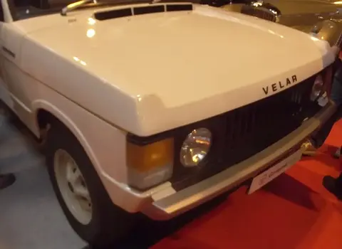 Close-up of the front of an original 1969 pre-production Range Rover prototype wearing its disguise 'VELAR' badge on the bonnet.