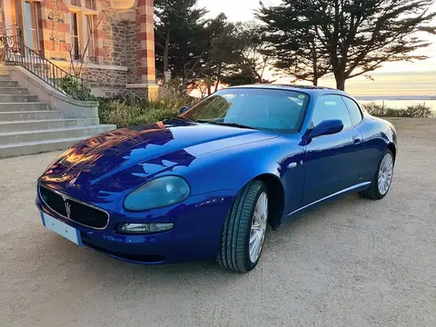 A blue Maserati Coupe 4200 GT, from the model that marked Maserati's return to the US market.