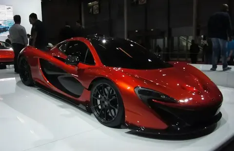 An orange McLaren P1 on the stand at the 2012 Paris Motor Show (Mondial de l'Automobile), where it made its debut.