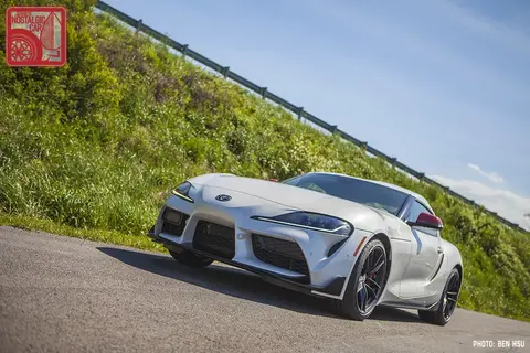 A silver Toyota GR Supra A90 photographed in a studio setting.