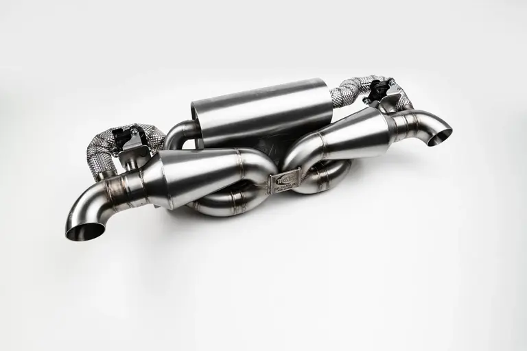 Exhaust system racing with valve control